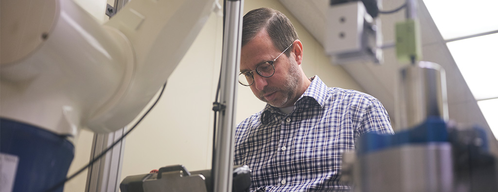 Photograph of Daniel McClelland, manager of Timken bearing and seal testing.